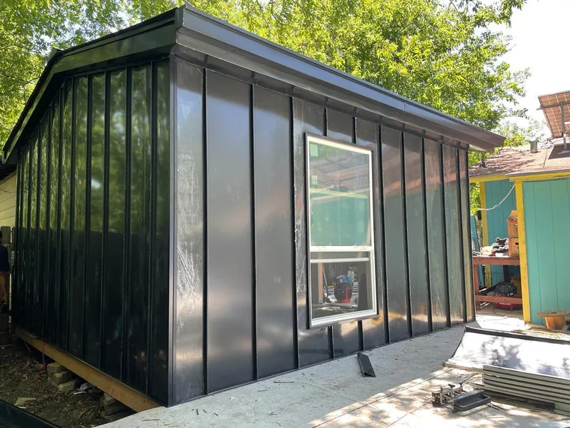 Black standing seam metal wall panels for Metal Roof Installation in Highland Park